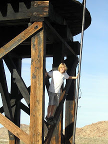 Kaiel climbs the tower.
