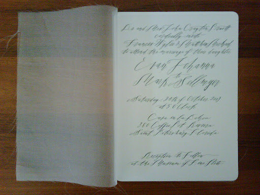 And here, shown with the fabric pulled aside to reveal the calligraphed invitation, designed by Hello!Lucky. And here, shown with the fabric pulled aside to reveal the calligraphed invitation, designed by Hello!Lucky.