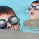 Picture taken at KIT triathlon in 2004.  This is a composite of two images I took of this kid in the pool.