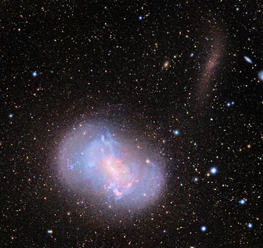 galáxia NGC 4449 e a galáxia anã NGC 4449B