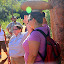 Natalie Demonstrates How The Traditional Aboriginal People Carried the Piti or Bowl With Food From Place To Place - Yulara. Australia