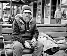 c0 homeless man on bench