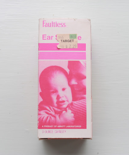 I found this waaay in the back of the very top shelf of the medicine cabinet. It is from when I was a baby! This packaging could be 27 years old.