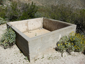 Cement water catchment in RockHouse Canyon circa 1942