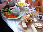 I set out some veggies with green goddess dip on a big platter and a cheese plate on my largest cutting board. My soy sauce ramekins are the perfect holders for honey and cranberry jelly, to go with the cheeses.
