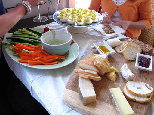 I set out some veggies with green goddess dip on a big platter and a cheese plate on my largest cutting board. My soy sauce ramekins are the perfect holders for honey and cranberry jelly, to go with the cheeses.