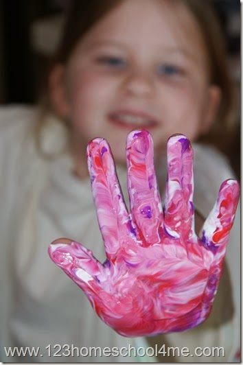 have your child squish their hand in the paint have your child squish their hand in the paint