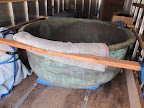 I remember this!  It's a beautiful giant copper pot that Martha got from Barbara Israel Garden Antiques.  http://www.bi-gardenantiques.com/