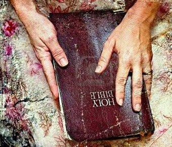 holding-a-well-worn-bible