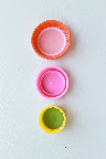 O.J. cap, milk cap, and lemon juice cap