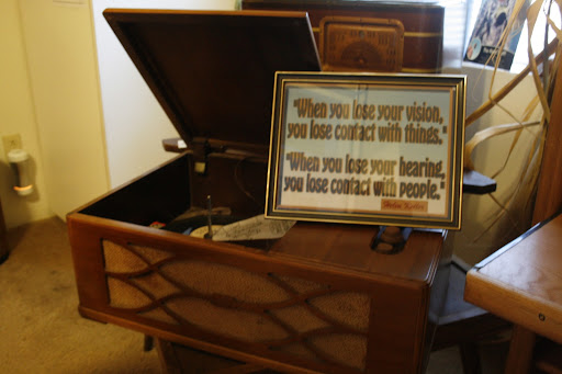 This corner of the museum housed old reacord players and radios, and bears a quote from Helen Keller. (Photo by: Kenrick Nobles)