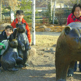 Eidan, Kai, and Maria outside of REI in Denver