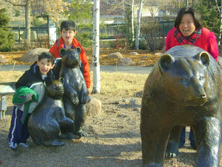 Eidan, Kai, and Maria outside of REI in Denver