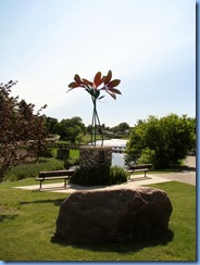 8586 Saskatchewan Swift Current - Prairie Lily sculpture  in park corner of 6th Ave NE & Herbert St