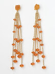 18ct gold with mandarin garnet earrings,length 7cm. 780.00