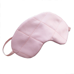 A satin eye mask from themonogramstudio.com.