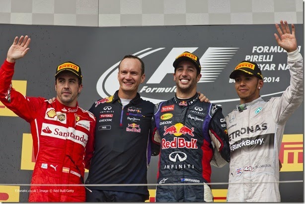 BUDAPEST, HUNGARY - JULY 27:  Daniel Ricciardo of Australia and Infiniti Red Bull Racing celebrates victory on the podium next Fernando Alonso of Spain and Ferrari and Lewis Hamilton of Great Britain and Mercedes GP after the Hungarian Formula One Grand Prix at Hungaroring on July 27, 2014 in Budapest, Hungary.  (Photo by Drew Gibson/Getty Images) *** Local Caption *** Daniel Ricciardo;Fernando Alonso;Lewis Hamilton