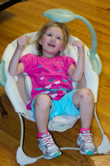 Sam sitting in a chair she shouldn't sit in