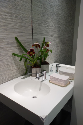 I put lady slipper orchids in all of the bathrooms.