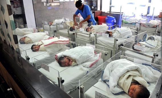 Newborns in incubators in India. From 1960 to 2009, India’s fertility rate dropped from six live births per woman to 2.5. Deshakalyan Chowdhury / AFP / Getty Images