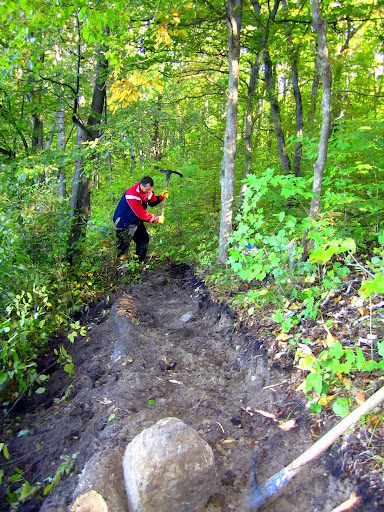 Pulaski work on the new trail. Everything is hand built.