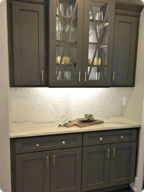 gray cabinets with brass