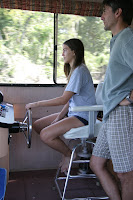 Sam driving the boat