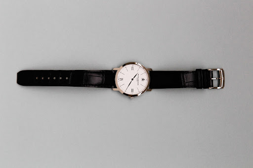 Alex wore a Classima collection Baume & Mercier watch. It is a traditional gift for a groom on his wedding day. Alex wore a Classima collection Baume & Mercier watch. It is a traditional gift for a groom on his wedding day.