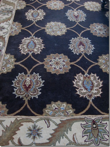 Patterned brown area rug 