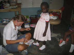 Chinaida gets new shoes.