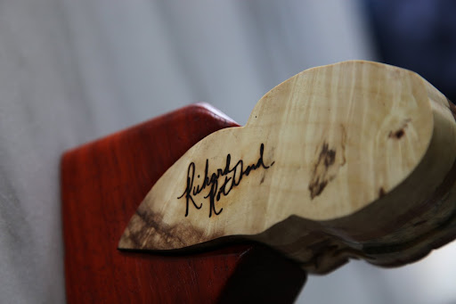 The back of her head is signed by the artist, Richard Rothbard.