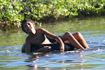 Inner tubing in the river Caraiva, Brazil