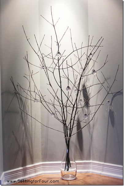 Sparkly Branch Centerpiece twinkles at night from Setting for Four #centerpiece #branch #decor #winter