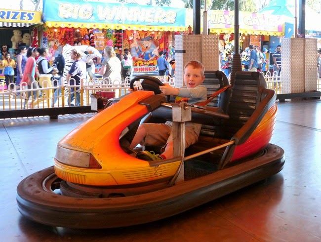 driving the dodgem car on his own driving the dodgem car on his own
