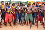 June 28, 2012 --- Day 8 of the indigenous occupation of the Belo Monte Dam Site along Brazil's Xingu River.  Tensions rise when the Federal Police arrives to notify the Xikrin, Arara, and Juruna peoples that the meeting with the President of Norte Energia (dam building consortium) will not take place at the site of the occupation but rather at the headquarters of Norte Energia.  More than 100 men, women and children eventually agreed to travel to Altamira.  The 3-hour meeting did not result in any agreements. Another meeting was scheduled for July 9th.  More than 300 people continue the occupation, stopping all construction on the main cofferdam on the Xingu river demanding that the project be suspended until the company fulfill its legal obligations to mitigate the serious impacts on 12 indigenous villages among these: inability to use the river for transportation, loss of fish, destruction of forest, loss of water quality, among other impacts. (Photo: Rafael Salazar)