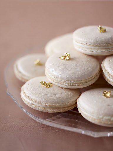 Dress these lovely pearlized macaroons with edible gold leaf for an unexpected embellishment. (Martha Stewart Weddings) Dress these lovely pearlized macaroons with edible gold leaf for an unexpected embellishment. (Martha Stewart Weddings)