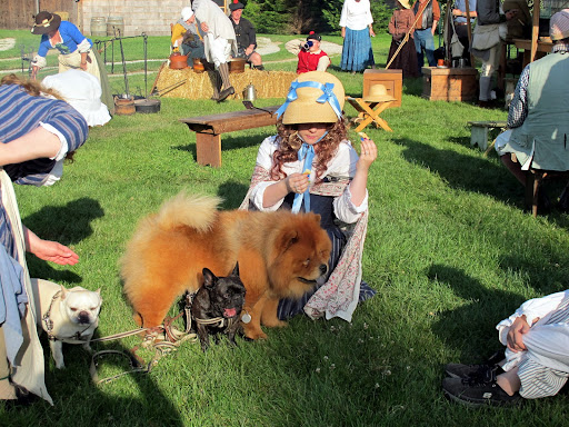 Oh, what fun!  So you all get to dress up in these costumes and pretend to be living during the Revolutionary War!  I think I could get into this...