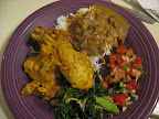 The final result (clockwise from top): the lamb madras on steamed basmati rice, a simple tomato and onion salad or cachumbar, the kale side, and the chicken tikka masala.