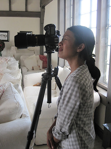 Katie takes a look through James's camera.