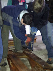 Using an old-style bit & brace to drill holes in picnic tables we're building