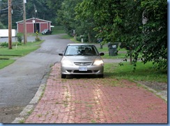 3618 Ohio - Wooster, OH - Lincoln Highway (end of Sylvan Rd) - remnant of original Lincoln Hwy...10 ft wide brick rd with concrete curbs - 1920s Apple Creek Bridge in background