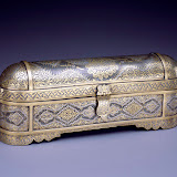 Pen box with hinged inkwell, inscribed with a prayer in the form of the tŭgra (imperial Ottoman monogram) and the phrase “He [God] is.” Turkey, ca. 1850. Steel overlaid with silver and gold. 9.6 x 2.2 x 3.8 in. (24.5 x 5.5 x 9.6). Private collection