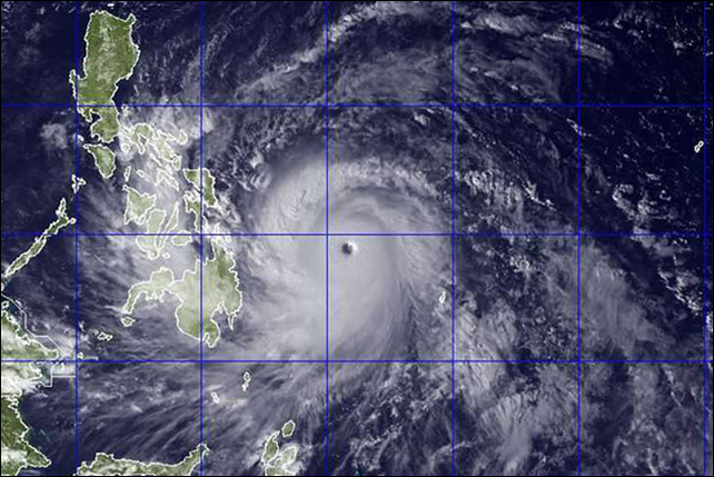 This satellite image provided by the U.S. Naval Research Lab shows Typhoon Haiyan as it tracked toward the Philippines on 7 November 2013. Photo: US Naval Research Lab / Associated Press