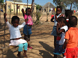 Ulusaba's Pride 'n Purpose has a home they built and fund for some orphans in our village. Most of their parents have died due to HIV/AIDS. Here are the kids hanging out there at their home, waiting to get a nice gift from Lora! South Africa - 407.jpg
