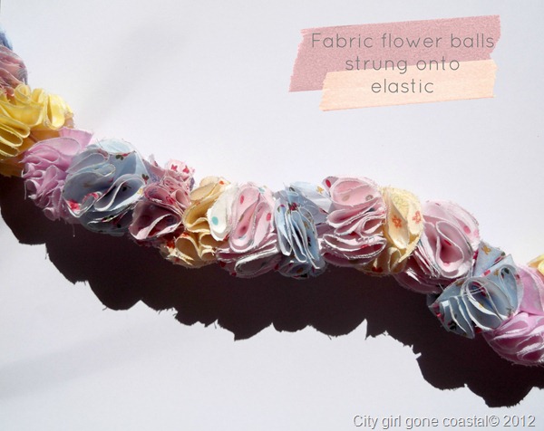 fabric puff balls strung on to elastic