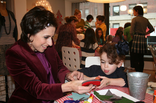 Darcy and Pipa are making one of many ornaments. Pipa, couldn't get enough of this craft and it was perfect for little hands. Darcy's daughters Daisy and Ella both made her button barrettes which she wore in her hair during the event.