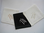 ForYourParty.com also made three color combos for the cloth cocktail napkins. Copper on white, silver on black, and gold on white. Hard to choose!