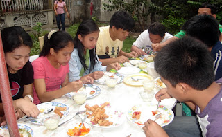 February 14: Students having lunch courtesy of Hazel Ann's family.