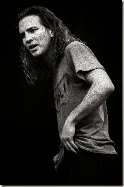 LANDGRAAF, NETHERLANDS - 8th JUNE: Lead singer Eddie Vedder from American rock band Pearl Jam performs live on stage at Pinkpop festival in Landgraaf, Netherlands on 8th June 1992. (Photo by Paul Bergen/Redferns)<br /><br />