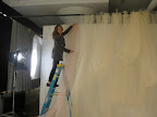 Melissa hanging some tulle and testing out the soft colors together